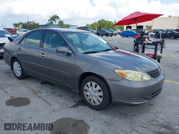 2002 Toyota Camry LE с VIN 4T1BE32K52U614396, выставлен на аукционе IAAI как лот 42345601 с пробегом 198 506 миль миль и . История ставок и продаж доступна на DreamBid. Изображение 1.