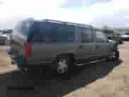 1999 Chevrolet Suburban с VIN 3GNFK16R6XG180176, выставлен на аукционе Copart как лот 86064714 с пробегом 291 118 миль миль и Списание • Salvage title. История ставок и продаж доступна на DreamBid. Изображение 3.