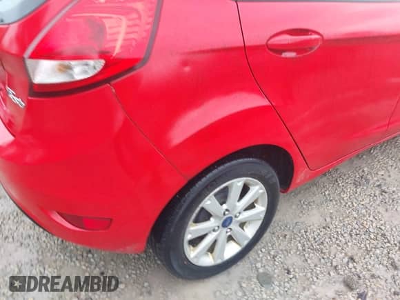 2012 Ford Fiesta SE with VIN 3FADP4EJ5CM157990, listed as a IAAI auction lot 43394653 with 59,792 mi miles and . Bid and sale history available at DreamBid. Image 13.