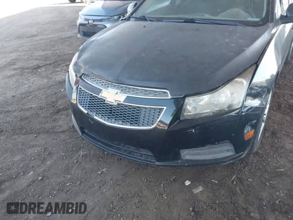 2012 Chevrolet Cruze LS z VIN 1G1PC5SH2C7379755, wystawiony jako IAAI lot #43475685 z przebiegiem 119 961 mil mil oraz . Historia ofert i sprzedaży dostępna na DreamBid. Obrazek 6.