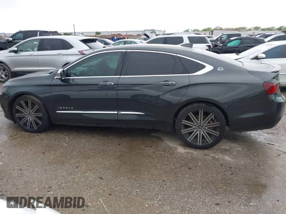 2015 Chevrolet Impala LTZ with VIN 1G1155SL8FU135991, listed as a IAAI auction lot 41895946 with 150,332 mi miles and . Bid and sale history available at DreamBid. Image 14.