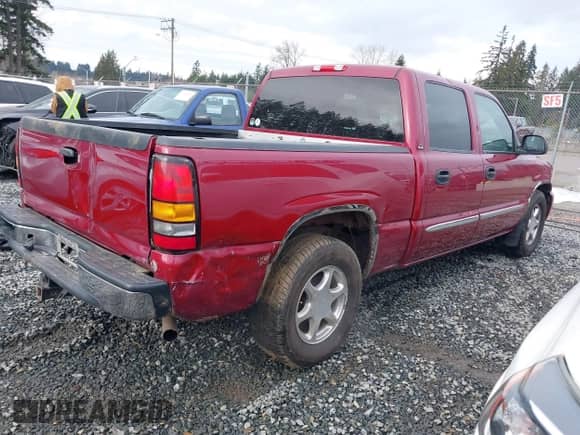 2005 GMC Sierra 1500 SLE with VIN 2GTEC13T751201219, listed as a IAAI auction lot 41460257 with 167,921 mi miles and . Bid and sale history available at DreamBid. Image 4.