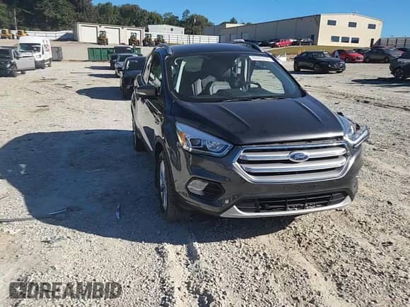 2017 Ford Escape Titanium с VIN 1FMCU9J97HUC73844, выставлен на аукционе Copart как лот 86480435 с пробегом 107 027 миль миль и Списание • Salvage title. История ставок и продаж доступна на DreamBid. Изображение 14.
