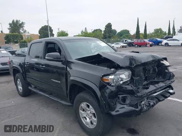 2017 Toyota Tacoma SR5 with VIN 3TMAZ5CN4HM047698, listed as a IAAI auction lot 42465382 with 132,297 mi miles and . Bid and sale history available at DreamBid. Image 1.