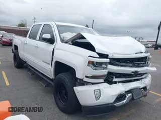 2017 Chevrolet Silverado 1500 LT z VIN 1GCUKRECXHF219494, wystawiony jako IAAI lot #42068897 z przebiegiem 102 812 mil mil oraz . Historia ofert i sprzedaży dostępna na DreamBid. Obrazek 1.