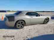 2012 Dodge Challenger SXT with VIN 2C3CDYAG4CH101526, listed as a Copart auction lot 90643015 with 130,011 mi miles and Clean title. Bid and sale history available at DreamBid. Image 3.