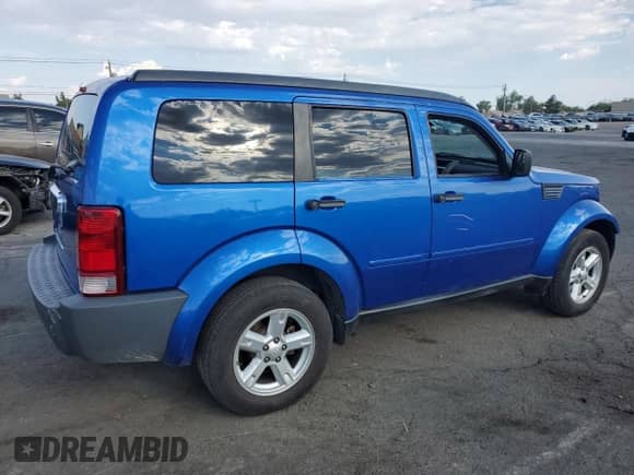 2007 Dodge Nitro SLT with VIN 1D8GT58K97W666341, listed as a Copart auction lot 69343634 with 168,897 mi miles and Salvage title. Bid and sale history available at DreamBid. Image 3.