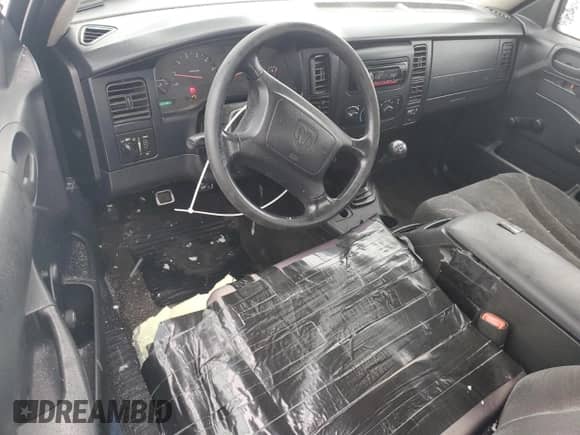 2003 Dodge Dakota с VIN 1D7HG12X23S345155, выставлен на аукционе Copart как лот 45223315 с пробегом 132 984 миль миль и Списание • Salvage title. История ставок и продаж доступна на DreamBid. Изображение 8.