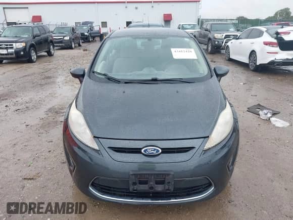 2011 Ford Fiesta SE with VIN 3FADP4EJ9BM156808, listed as a IAAI auction lot 43412420 with 78,092 mi miles and . Bid and sale history available at DreamBid. Image 12.