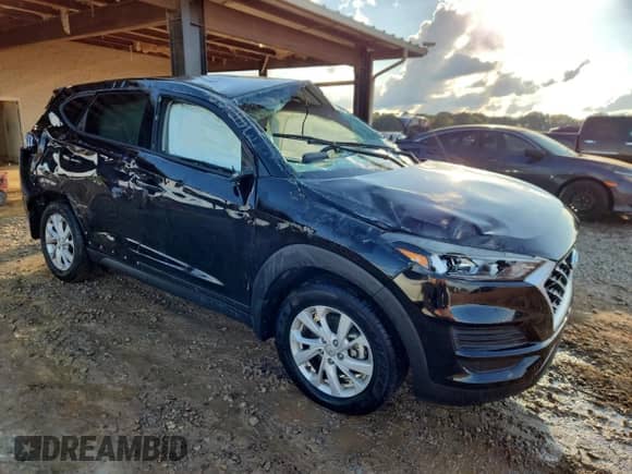 2020 Hyundai Tucson SE with VIN KM8J23A41LU106967, listed as a Copart auction lot 84273005 with 105,162 mi miles and Salvage title. Bid and sale history available at DreamBid. Image 4.