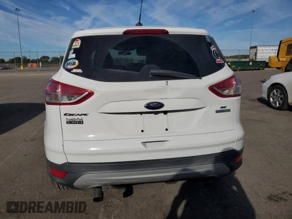 2014 Ford Escape SE с VIN 1FMCU0GX2EUD85934, выставлен на аукционе Copart как лот 82550975 с пробегом 156 384 миль миль и Списание • Salvage title. История ставок и продаж доступна на DreamBid. Изображение 6.