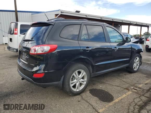2012 Hyundai Santa Fe Limited с VIN 5XYZKDAG8CG138307, выставлен на аукционе Copart как лот 81083725 с пробегом 159 951 миль миль и Списание • Salvage title. История ставок и продаж доступна на DreamBid. Изображение 3.