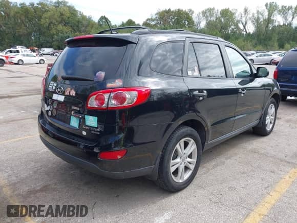 2011 Hyundai Santa Fe Limited with VIN 5XYZK4AG0BG024235, listed as a IAAI auction lot 43427529 with 298,672 mi miles and . Bid and sale history available at DreamBid. Image 4.