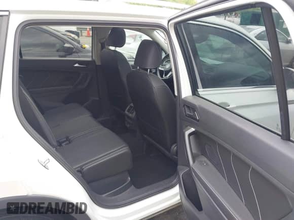 2023 Volkswagen Tiguan SE with VIN 3VVMB7AX0PM036876, listed as a IAAI auction lot 42023415 with 42,003 mi miles and . Bid and sale history available at DreamBid. Image 8.