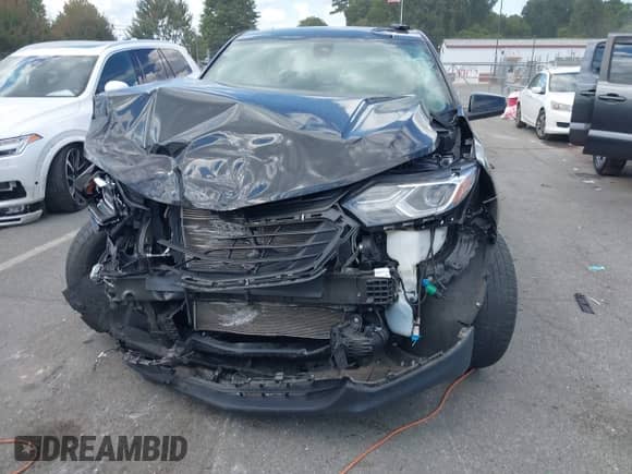 2020 Chevrolet Equinox LT z VIN 2GNAXUEV3L6109129, wystawiony jako IAAI lot #43202556 z przebiegiem 86 019 mil mil oraz . Historia ofert i sprzedaży dostępna na DreamBid. Obrazek 11.