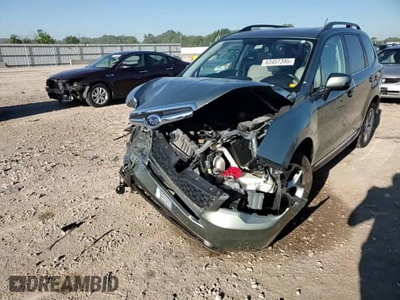 2015 Subaru Forester Touring with VIN JF2SJAUC5FH469225, listed as a Copart auction lot 63457395 with 50,814 mi miles and Salvage title. Bid and sale history available at DreamBid. Image 14.