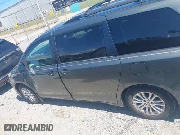 2013 Toyota Sienna XLE with VIN 5TDYK3DC6DS364168, listed as a IAAI auction lot 43321741 with 196,566 mi miles and . Bid and sale history available at DreamBid. Image 14.