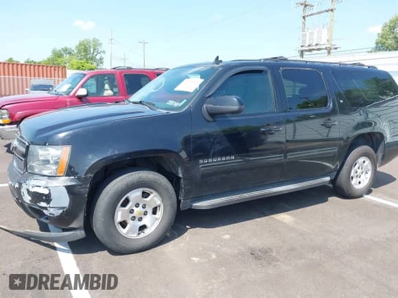 2011 Chevrolet Suburban LT with VIN 1GNSKJE34BR151246, listed as a IAAI auction lot 42520210 with 239,240 mi miles and . Bid and sale history available at DreamBid. Image 2.
