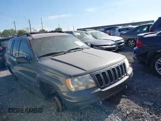 2002 Jeep Grand Cherokee Overland with VIN 1J8GW68J32C239016, listed as a IAAI auction lot 37336251 with 190,188 mi miles and . Bid and sale history available at DreamBid. Image 1.