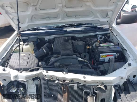 2012 Chevrolet Colorado Work Truck z VIN 1GCCSBF9XC8130009, wystawiony jako IAAI lot #43287788 z przebiegiem 151 906 mil mil oraz . Historia ofert i sprzedaży dostępna na DreamBid. Obrazek 10.