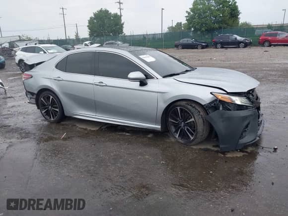 2018 Toyota Camry XSE with VIN 4T1BZ1HK8JU013871, listed as a IAAI auction lot 42603289 with 70,522 mi miles and . Bid and sale history available at DreamBid. Image 1.