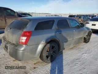 2006 Dodge Magnum R/T с VIN 2D4GV57256H187683, выставлен на аукционе Copart как лот 87879585 с пробегом 260 895 миль миль и Списание • Salvage title. История ставок и продаж доступна на DreamBid. Изображение 3.