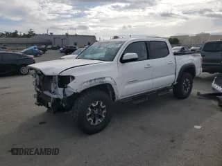 2021 Toyota Tacoma TRD Off Road z VIN 3TMCZ5AN6MM444741, wystawiony jako Copart lot #84763395 z przebiegiem 43 682 mil mil oraz Szkoda całkowita • Salvage title. Historia ofert i sprzedaży dostępna na DreamBid. Obrazek 1.