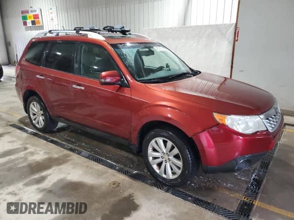 2011 Subaru Forester X Touring with VIN JF2SHAGC4BH702223, listed as a Copart auction lot 51078765 with 167,893 mi miles and Salvage title. Bid and sale history available at DreamBid. Image 4.