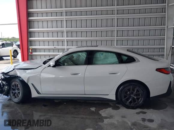 2023 BMW i4 eDrive35 с VIN WBY43AW04PFP93394, выставлен на аукционе IAAI как лот 42742954 с пробегом 30 266 миль миль и . История ставок и продаж доступна на DreamBid. Изображение 15.