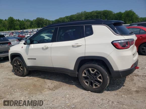 2017 Jeep Compass Trailhawk with VIN 3C4NJDDB8HT646763, listed as a Copart auction lot 60146095 with 132,504 mi miles and Salvage title. Bid and sale history available at DreamBid. Image 2.