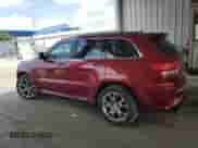 2012 Jeep Grand Cherokee SRT-8 z VIN 1C4RJFDJ9CC297461, wystawiony jako Copart lot #69259795 z przebiegiem Nie podano mil oraz Czysty tytuł • Clean title. Historia ofert i sprzedaży dostępna na DreamBid. Obrazek 2.