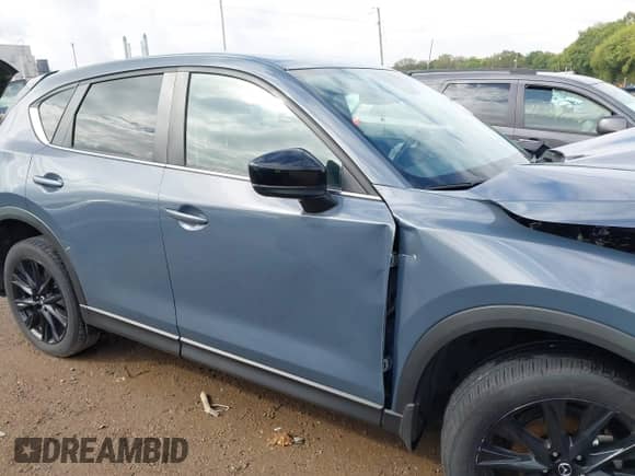 2023 Mazda CX-5 S Carbon Edition с VIN JM3KFBCM9P0167900, выставлен на аукционе IAAI как лот 43291236 с пробегом 40 306 миль миль и . История ставок и продаж доступна на DreamBid. Изображение 13.