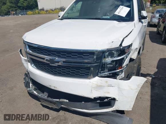 2015 Chevrolet Tahoe LT with VIN 1GNSKBKC1FR175813, listed as a IAAI auction lot 43113210 with 165,599 mi miles and . Bid and sale history available at DreamBid. Image 6.