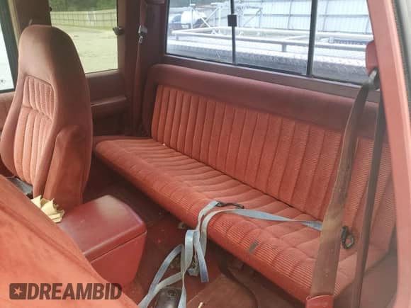 1994 GMC Sierra 1500 z VIN 2GTEC19K5R1587191, wystawiony jako Copart lot #70108465 z przebiegiem 215 236 mil mil oraz Szkoda całkowita • Salvage title. Historia ofert i sprzedaży dostępna na DreamBid. Obrazek 10.