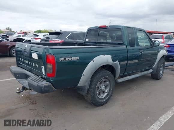 2002 Nissan Frontier XE with VIN 1N6ED26T82C309169, listed as a IAAI auction lot 42201511 with 214,243 mi miles and . Bid and sale history available at DreamBid. Image 4.