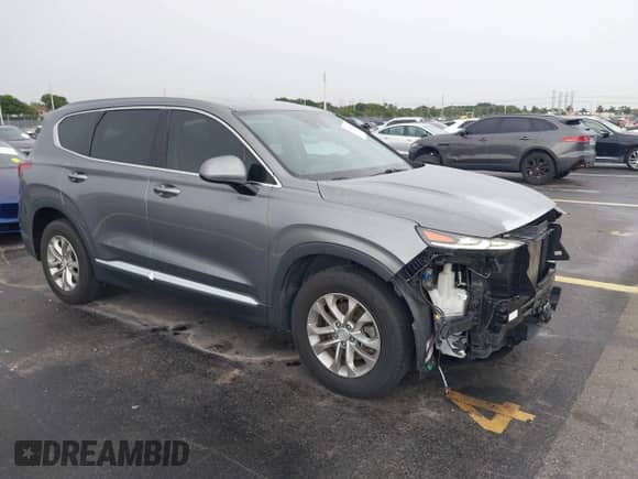 2019 Hyundai Santa Fe SEL with VIN 5NMS33AD0KH079644, listed as a IAAI auction lot 43240251 with 57,648 mi miles and . Bid and sale history available at DreamBid. Image 1.