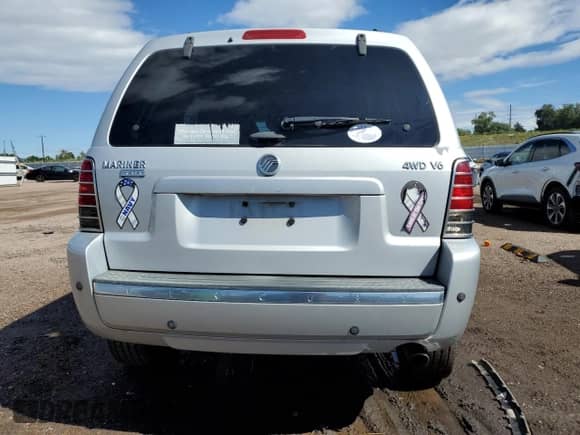 2007 Mercury Mariner Premier with VIN 4M2CU97137KJ04575, listed as a Copart auction lot 70735655 with 91,350 mi miles and Salvage title. Bid and sale history available at DreamBid. Image 6.