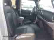 2023 Jeep Wrangler Sahara with VIN 1C4JJXP69PW695915, listed as a IAAI auction lot 42662028 with 36,957 mi miles and . Bid and sale history available at DreamBid. Image 5.