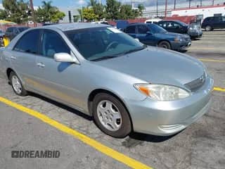 2002 Toyota Camry XLE with VIN 4T1BF32KX2U535609, listed as a IAAI auction lot 43242580 with 163,422 mi miles and . Bid and sale history available at DreamBid. Image 1.