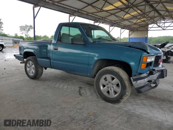 1997 GMC Sierra 1500 с VIN 1GTEK14R2VZ514577, выставлен на аукционе Copart как лот 54443015 с пробегом 214 823 миль миль и Списание • Salvage title. История ставок и продаж доступна на DreamBid. Изображение 4.