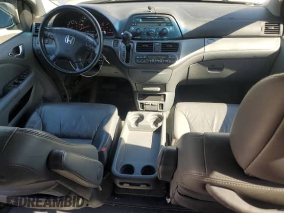 2007 Honda Odyssey EX-L с VIN 5FNRL38747B439232, выставлен на аукционе Copart как лот 81683965 с пробегом 211 602 миль миль и Списание • Salvage title. История ставок и продаж доступна на DreamBid. Изображение 8.