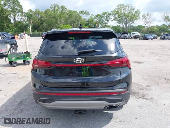 2021 Hyundai Santa Fe SE with VIN 5NMS14AJ0MH332918, listed as a IAAI auction lot 42365534 with 58,720 mi miles and . Bid and sale history available at DreamBid. Image 16.