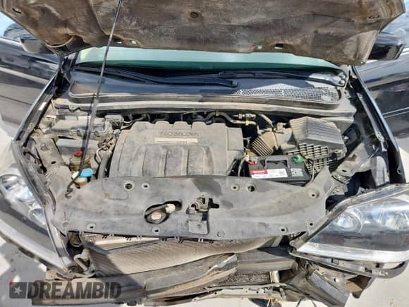 2007 Honda Odyssey EX-L z VIN 5FNRL38627B056882, wystawiony jako Copart lot #82173585 z przebiegiem 214 207 mil mil oraz Szkoda całkowita • Salvage title. Historia ofert i sprzedaży dostępna na DreamBid. Obrazek 12.