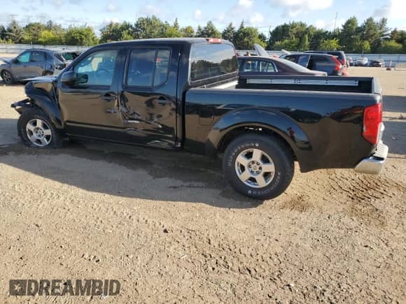 2007 Nissan Frontier SE with VIN 1N6AD09U07C455497, listed as a Copart auction lot 71618105 with 126,079 mi miles and Salvage title. Bid and sale history available at DreamBid. Image 2.