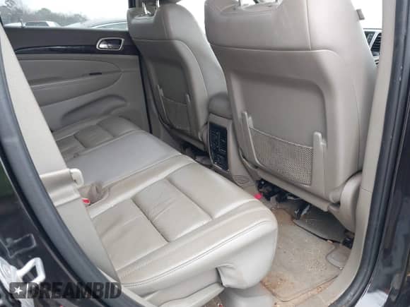 2012 Jeep Grand Cherokee Laredo z VIN 1C4RJEAG1CC229237, wystawiony jako IAAI lot #41613422 z przebiegiem 206 633 mil mil oraz . Historia ofert i sprzedaży dostępna na DreamBid. Obrazek 8.