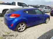 2014 Hyundai Veloster z VIN KMHTC6AD0EU216273, wystawiony jako Copart lot #71863895 z przebiegiem 135 228 mil mil oraz Czysty tytuł • Clean title. Historia ofert i sprzedaży dostępna na DreamBid. Obrazek 3.