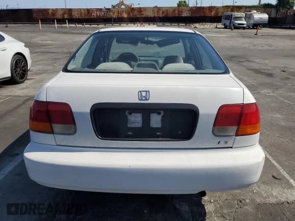 1996 Honda Civic with VIN 1HGEJ6500TL033843, listed as a Copart auction lot 55334335 with 131,654 mi miles and Salvage title. Bid and sale history available at DreamBid. Image 6.