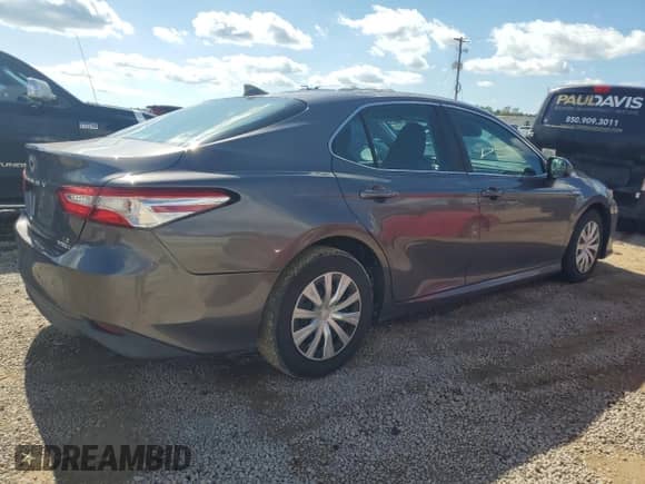 2019 Toyota Camry Hybrid LE с VIN 4T1B31HK6KU509349, выставлен на аукционе Copart как лот 90061815 с пробегом 76 314 миль миль и Списание • Salvage title. История ставок и продаж доступна на DreamBid. Изображение 3.