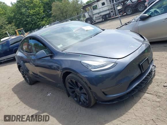 2023 Tesla Model Y Long Range with VIN 7SAYGDEE0PA056378, listed as a IAAI auction lot 43086315 with 22,635 mi miles and . Bid and sale history available at DreamBid. Image 1.