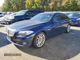 2011 BMW 5 Series 550i xDrive with VIN WBAFU9C50BC784690, listed as a Copart auction lot 82332795 with 148,899 mi miles and Clean title. Bid and sale history available at DreamBid. Image 1.